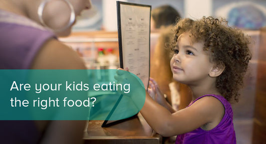 A kid with a kid's menu.