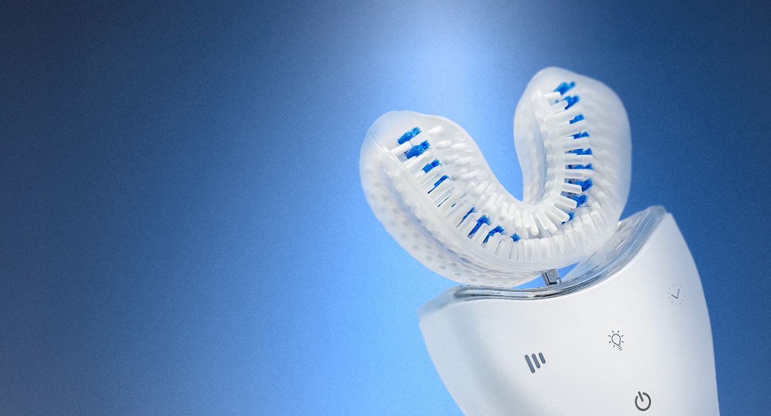 White dental device with blue accents on a blue background