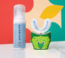 Autobrush mint dental product with a green dinosaur-shaped holder on a colorful background #sonicprokidsbundle