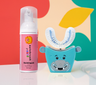 Automated toothbrush and toothpaste with hippo design on a colorful background. #sonicprokidsbundle