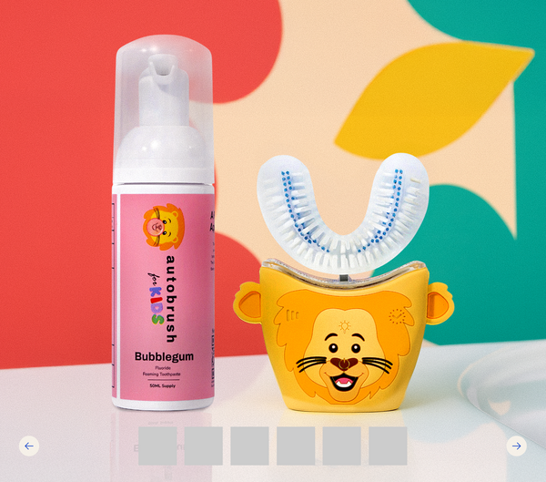 Automated toothbrush and toothpaste with lion design on a colorful background. #sonicprokidsbundle