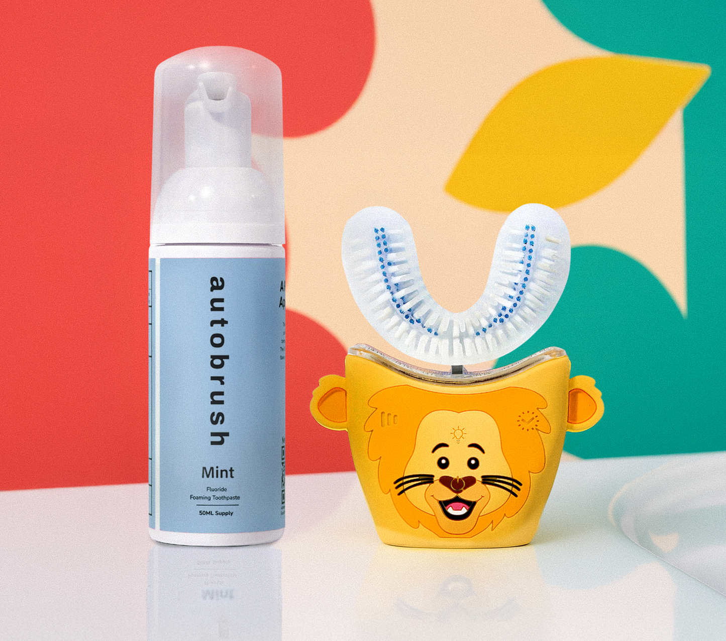 Autobrush mint dental product with lion-shaped container on a colorful background. #sonicprokidsbundle