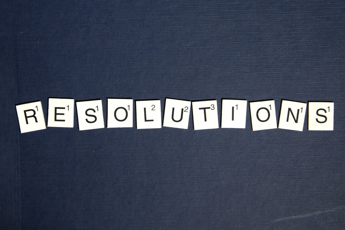 Scrabble tiles spelling out "Resolutions", for AutoBrush