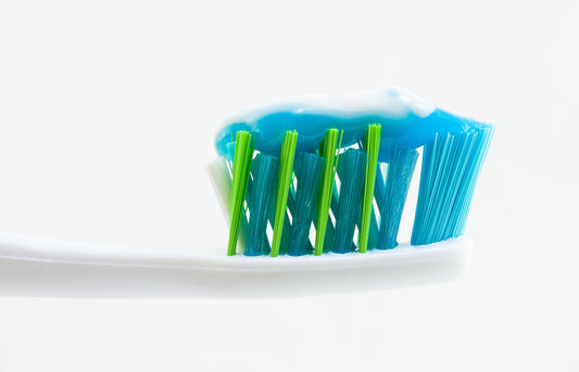 Toothbrush with toothpaste on white background, for Autobrush