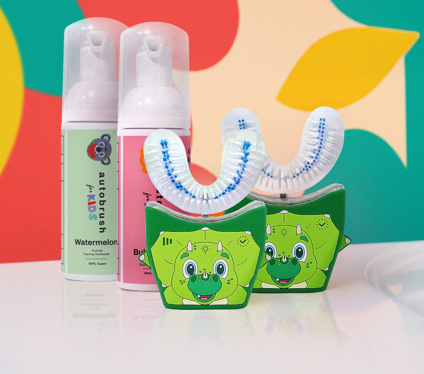 Two kids U-shape toothbrushes with cartoon characters and toothpaste. #siblingpack