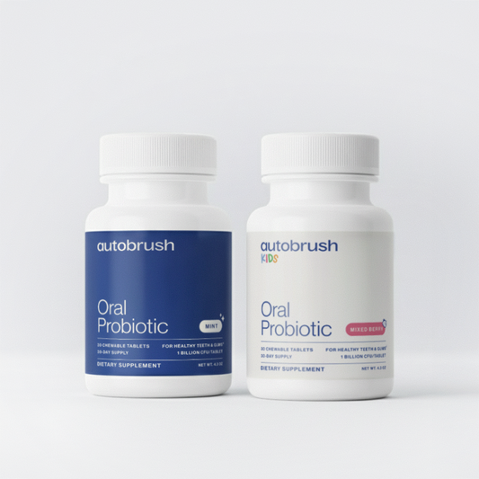 Two bottles of autobrush oral probiotic supplements on a white background