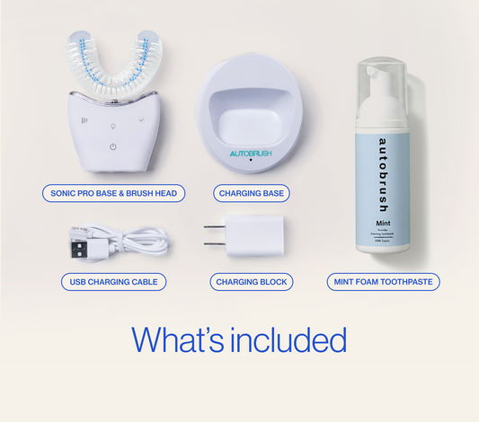 Autobrush dental care product set including base, brush head, charging base, USB cable, charging block, and mint foam toothpaste on a light background. #sonicprobundle