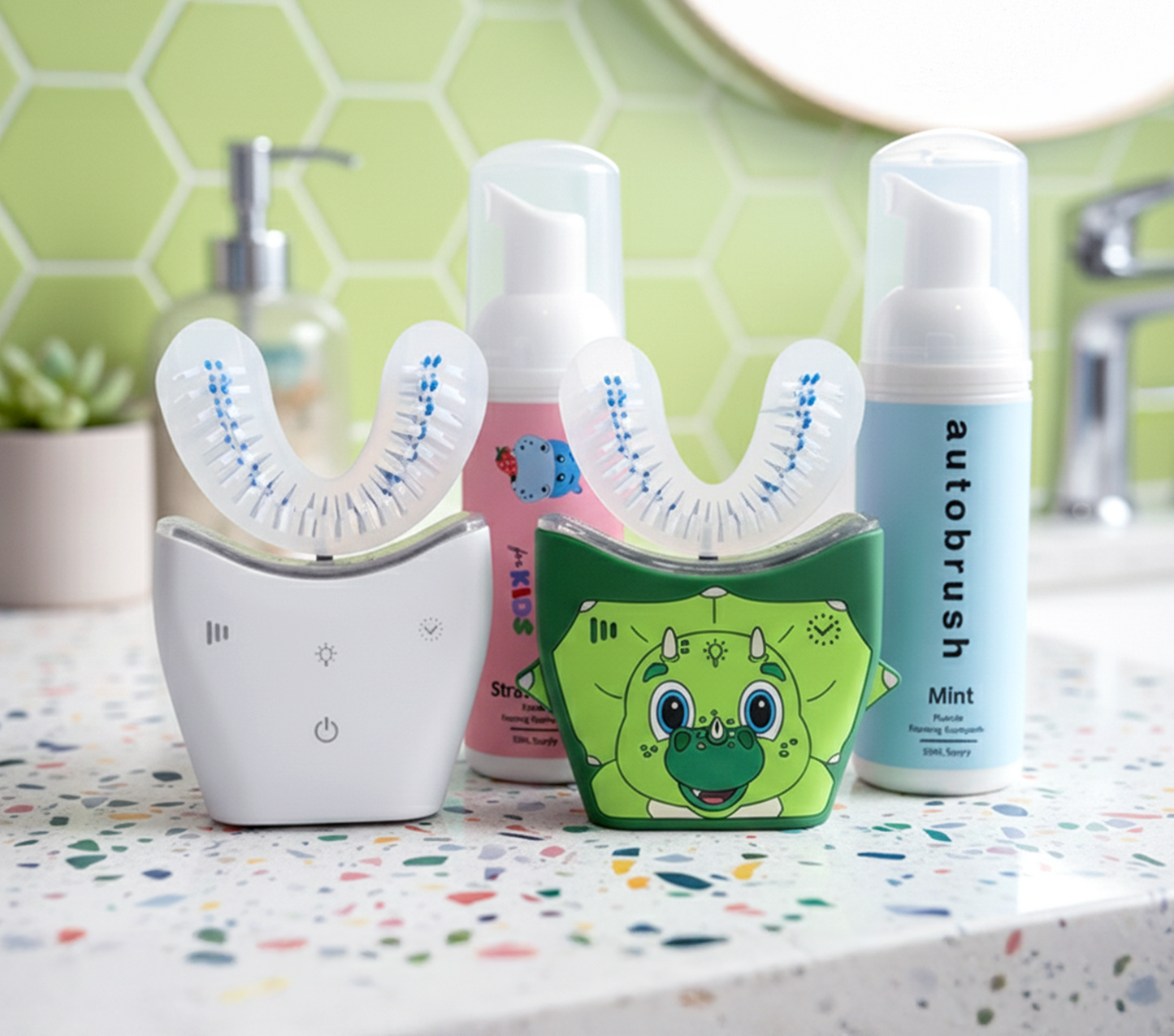 Automated toothbrush and toothpaste on a bathroom counter with a green tiled wall background. #familypack