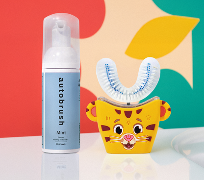 Automated toothbrush and mouthwash bottle with a colorful abstract background #sonicprokidsbundle