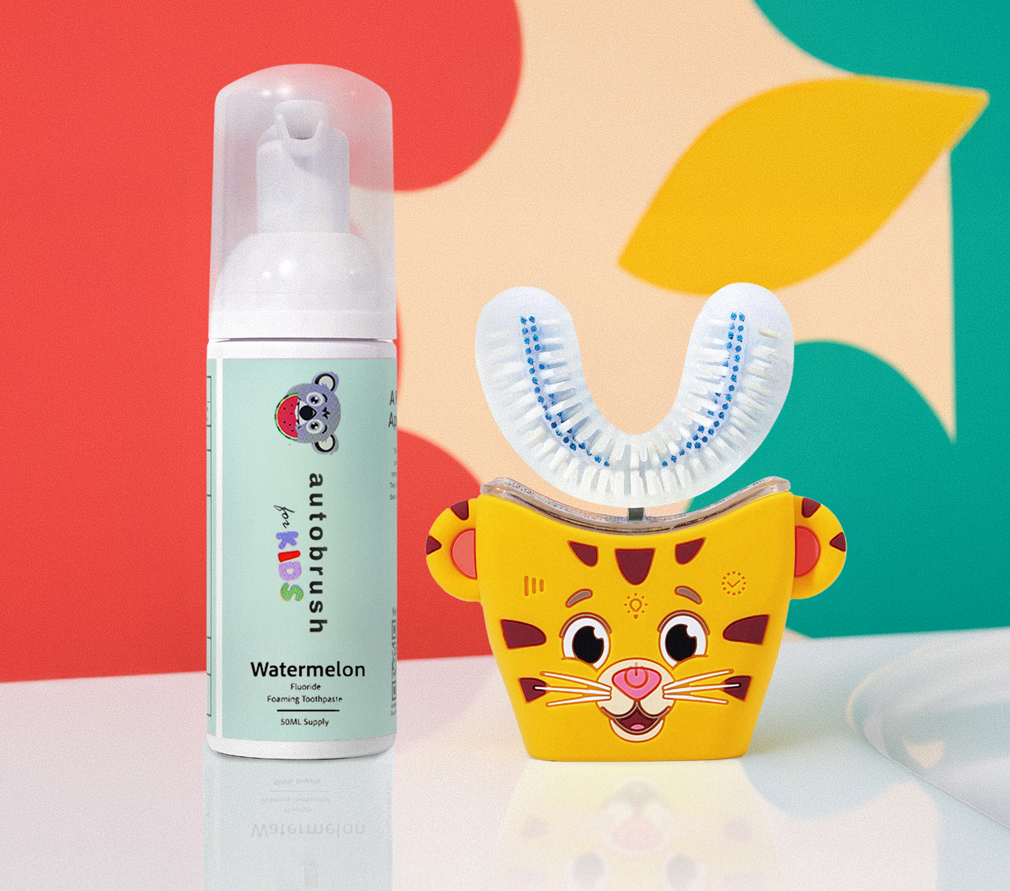 Children's toothbrush and fluoride spray with a colorful background. #sonicprokidsbundle